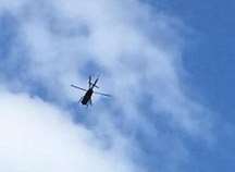 The police helicopter hovering above Chatham. Picture: Ian Gandon.