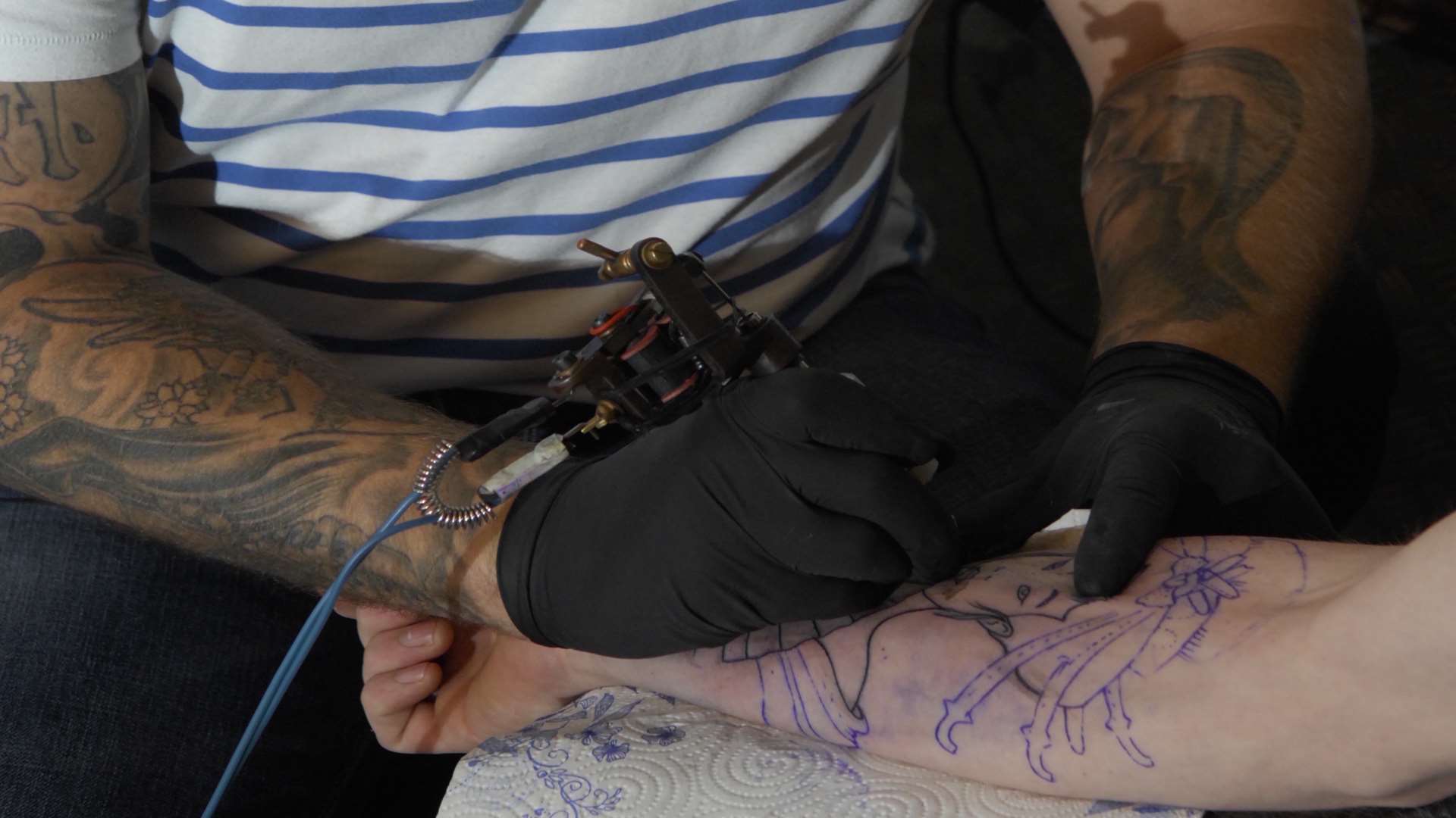 Tattoo artist, Tom Rosewell, is offering a day's worth of tattooing