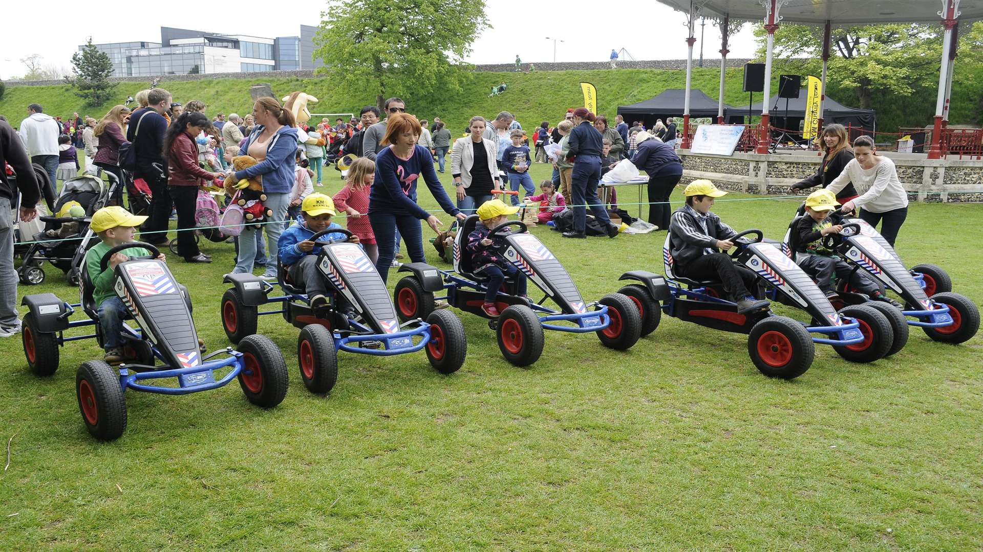 Pedal go-karts are a popular activity at the KM Walk to School mini festival Buster's Big Bash at Canterbury's Dane John Gardens.