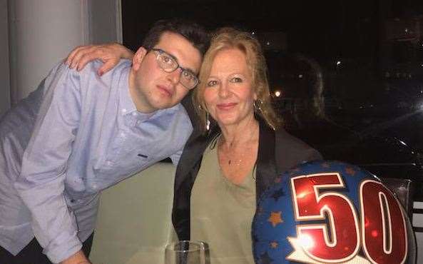 George and his mum Karen celebrating a 50th birthday