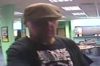 Do you recognise this man? Police want to identify him after a burglary at a bookmakers.