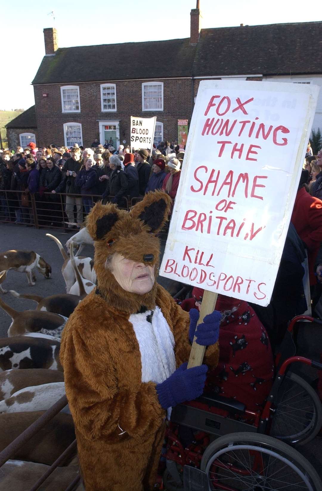 Protests as the East Kent Hunt gathers for traditional Boxing Day hunt at Elham square in 2001.