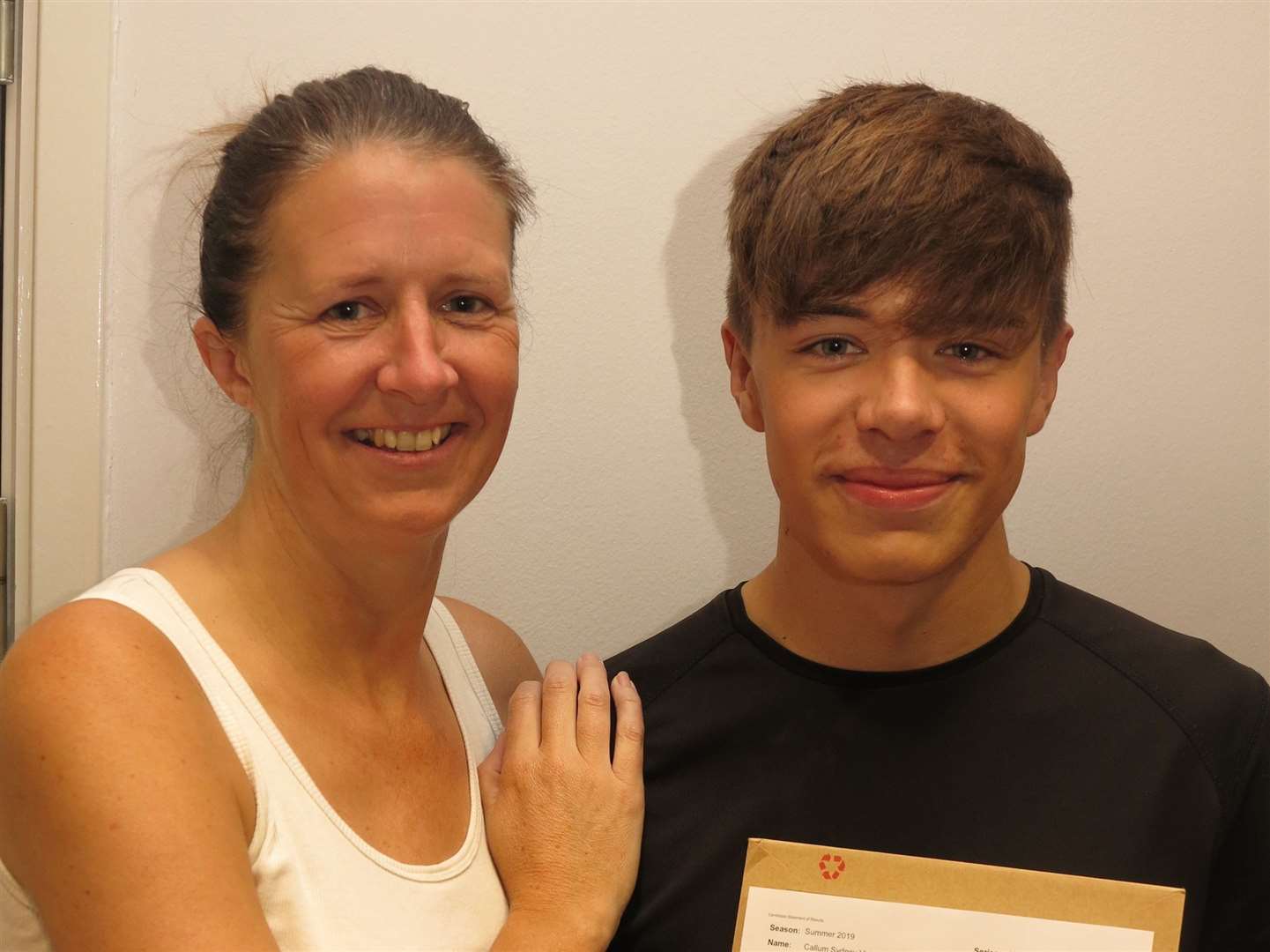 Callum Budden and his mum celebrated after his success (15620736)