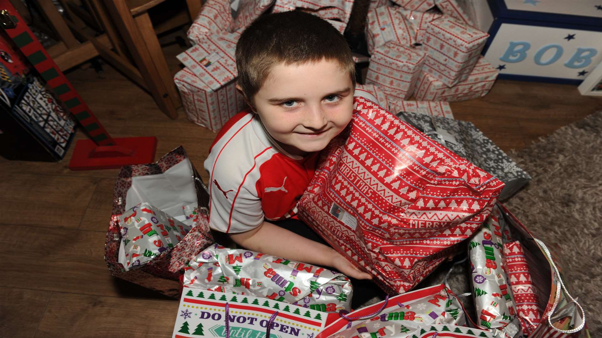 Lewis will be handing out presents at Medway Maritime Hospital today.