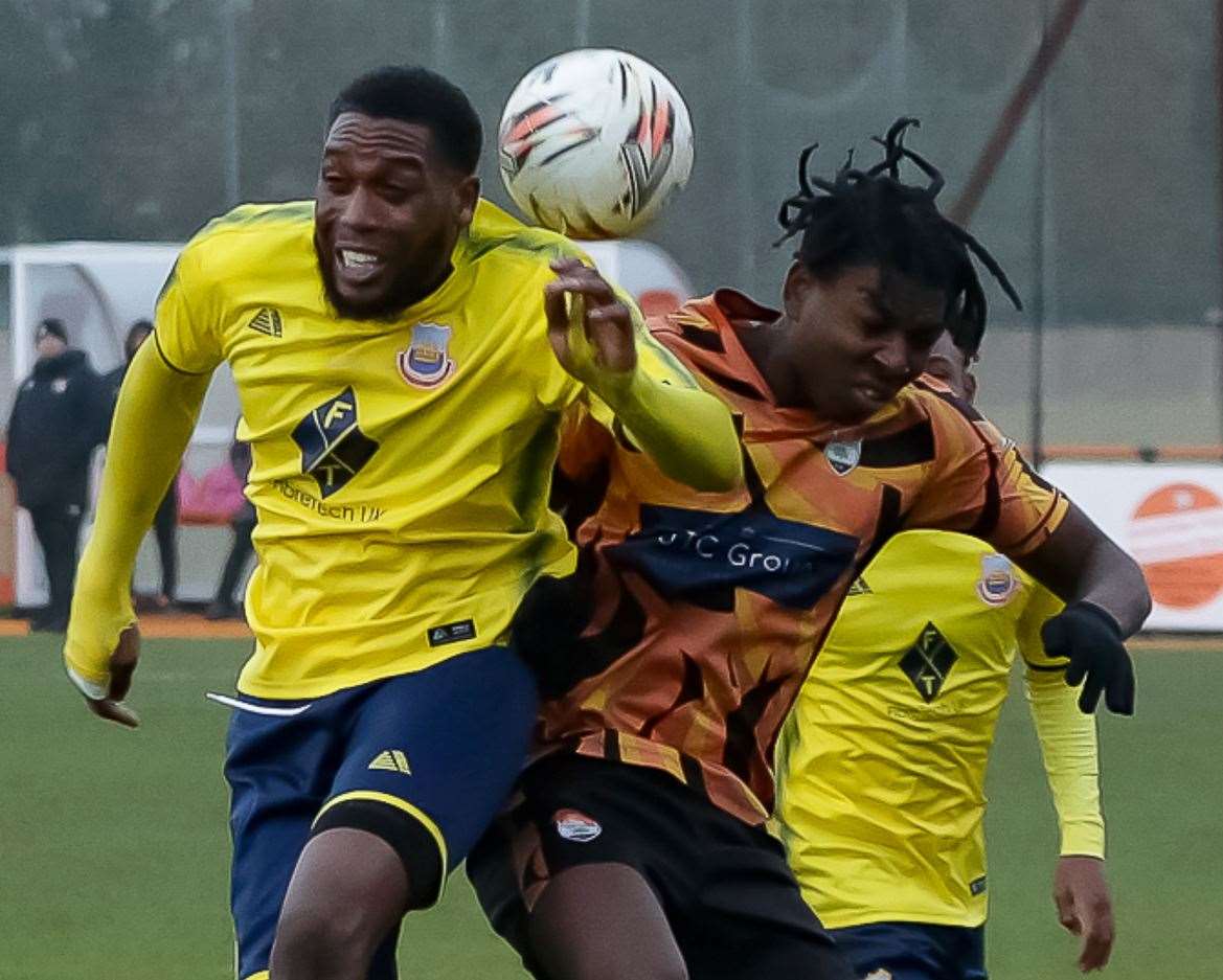 Whitstable’s Emmanuel Oloyede competes in the air during Saturday’s 4-0 victory at Lordswood. Picture: Les Biggs