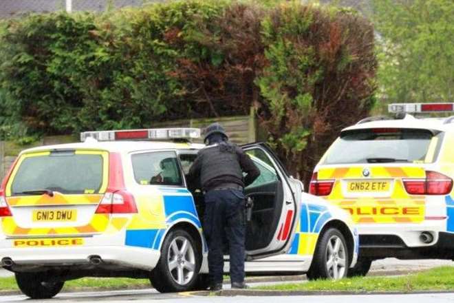 Sever police cars in Watling Street, Sittingbourne, after the hoax call. Picture: Travers Bean