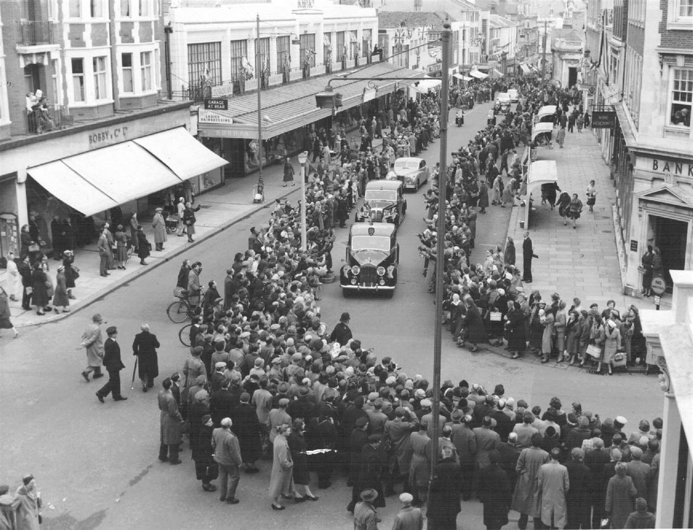 The royal cavalcade of vehicles passes the store during a visit to Folkestone by the Queen Duke of Edinburgh on March 28, 1958. The party was on its way to the Leas Cliff Hall. Picture courtesy: Alan Taylor.