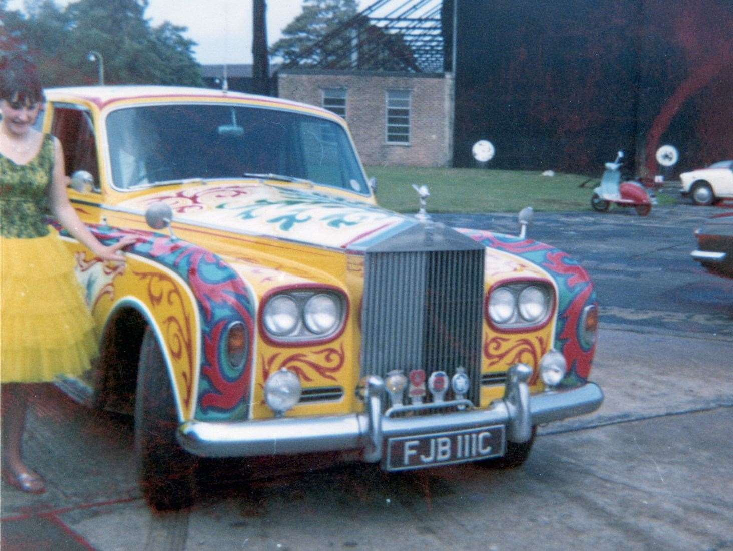 Jean Eames from Ditton poses in her dancing costume with John Lennon's Rolls Royce at West Malling airfield in 1967. Cynthia and Julian Lennon are in the back of the car. Submitted by Colin Eames