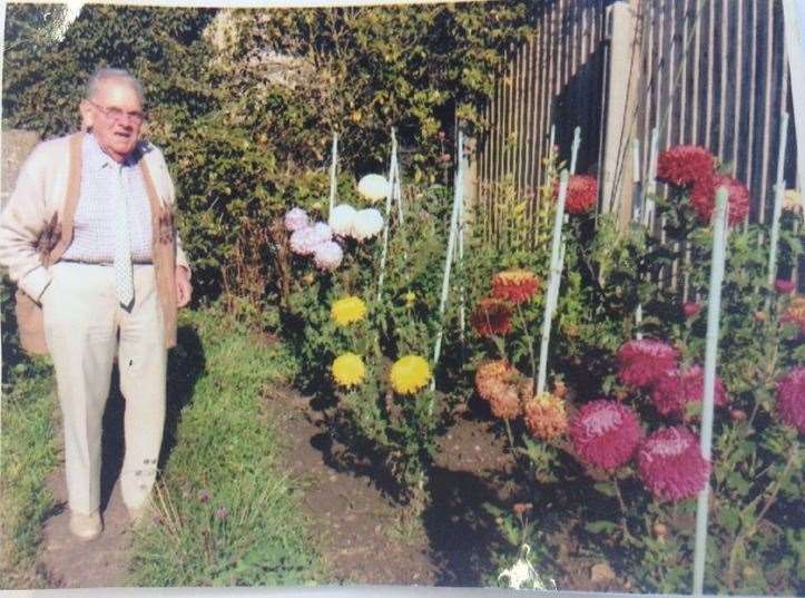 Rod Gates, 84, in his garden in London Road, Newington, Sittingbourne, with his prized chrysanthemums