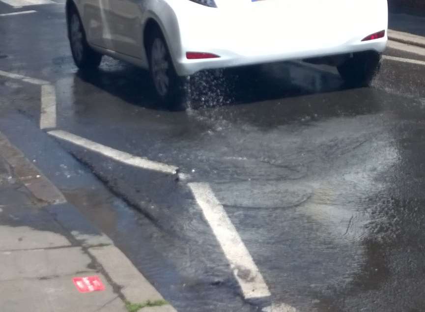 Water leaking into the road
