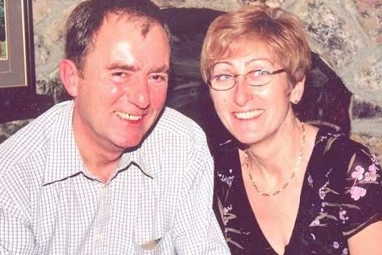Brian Holmes, pictured with his wife Christine, died after a row about a disabled parking space