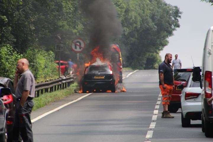 Car on fire at Detling Hill. Picture: Michael Donnelly