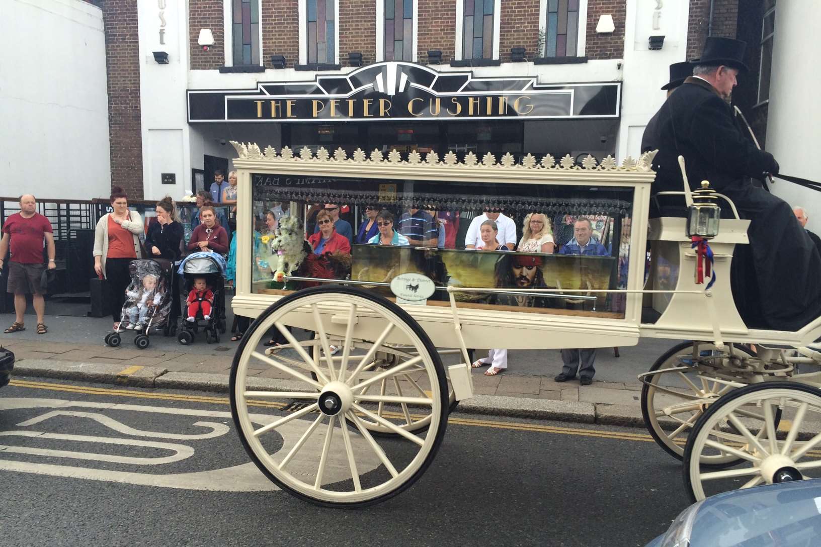 An ornate hearse carried a coffin with Jack Sparrow painted on it... one of Reece's heroes