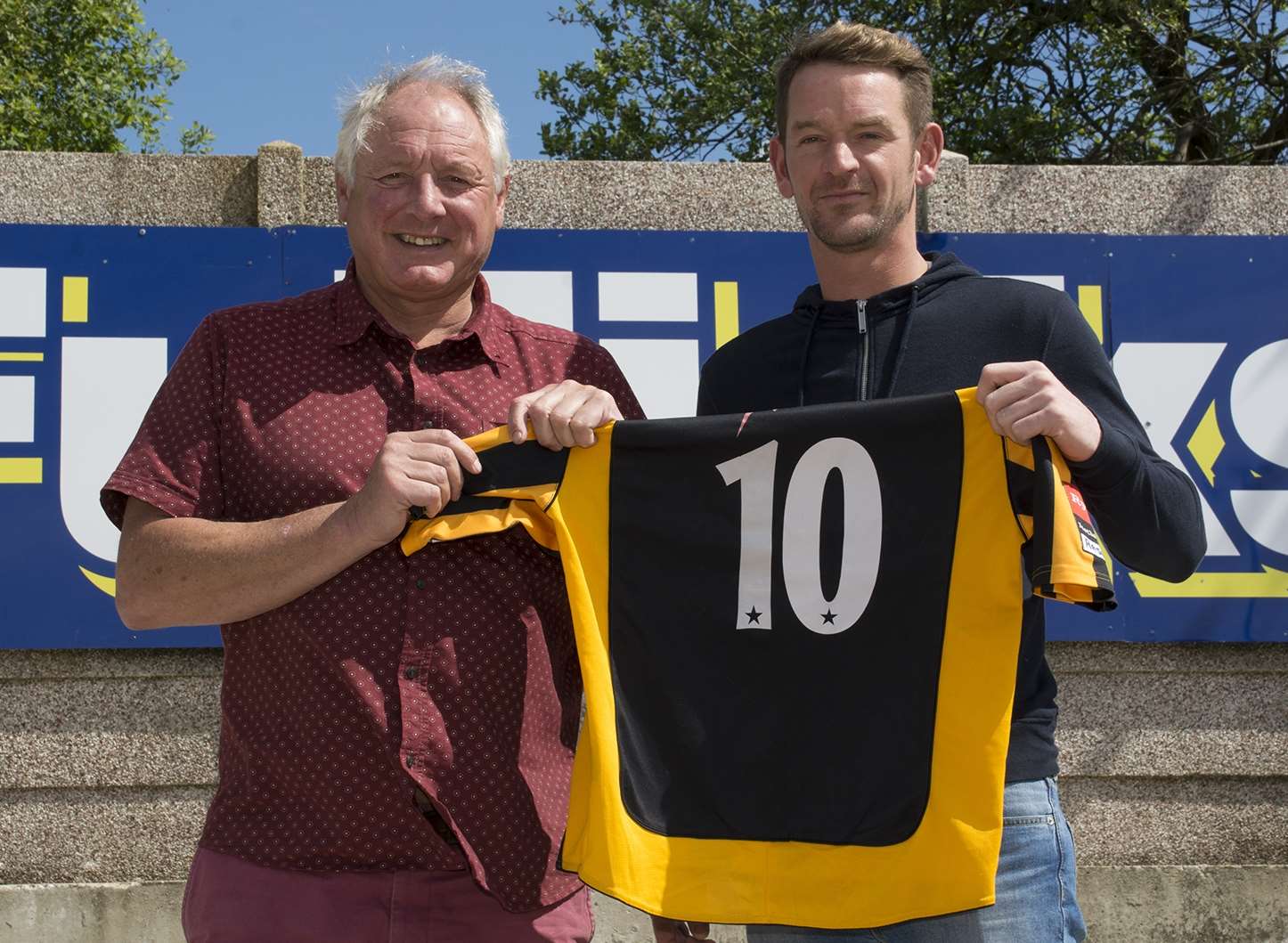 Folkestone boss Neil Cugley with new signing Carl Rook Picture: Don Linkin