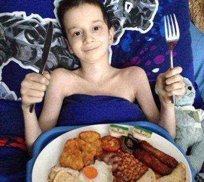 Reece Puddington enjoying a cooked breakfast in bed as part of his bucket list