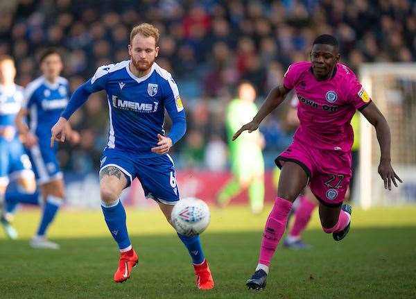 Connor Ogilvie looks to get onto the loose ball before Kwadwo Baah during the meeting at Priestfield Picture: Ady Kerry