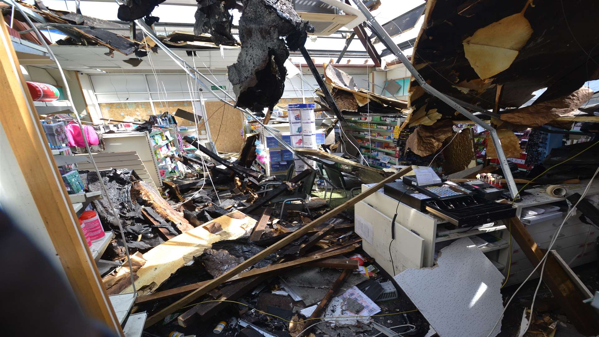 The interior of the fire-damaged Paydens Pharmacy in Mill Court, Ashford