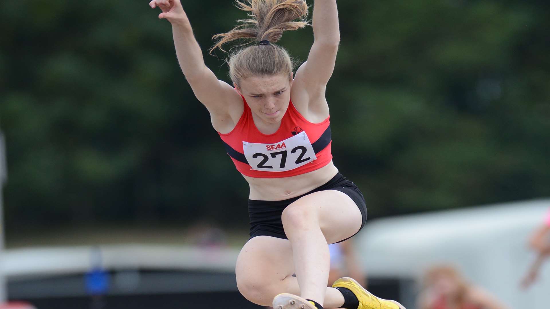 Medway and Maidstone's Emily Featherstone in long jump action at the South of England Young Athletes Championships Picture: Gary Browne