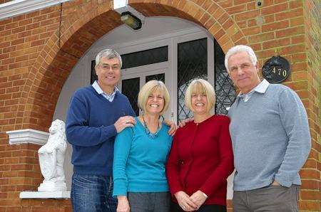 From left, Chas and Diane Howell, Jo and Graham Hatfield. Twins Jo Hatfield and Diane Howell have lived together in the same house with their respective husbands and children since 1989.