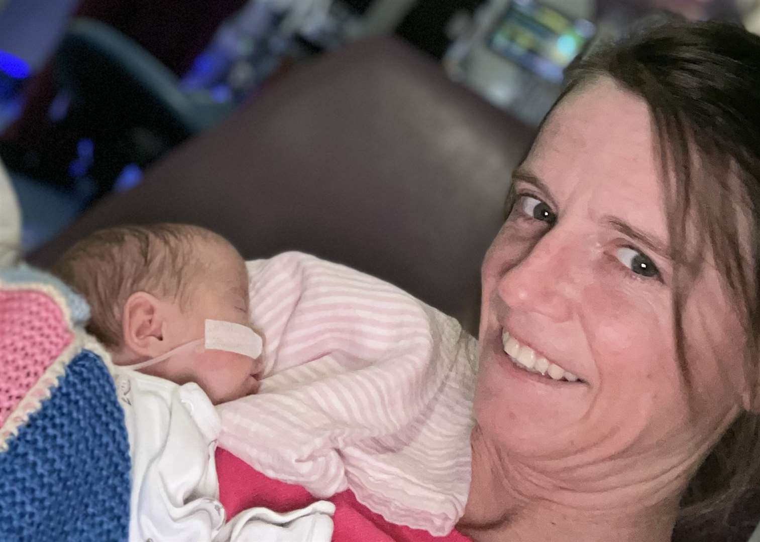 Louise Cutting cuddles her daughter Nancy who spent over 90 days in hospital