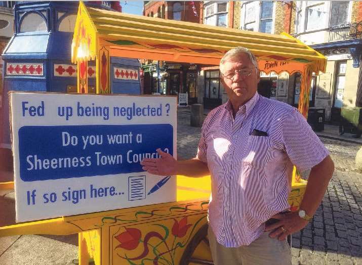 Brian Spoor collecting names for the town council petition in Sheerness