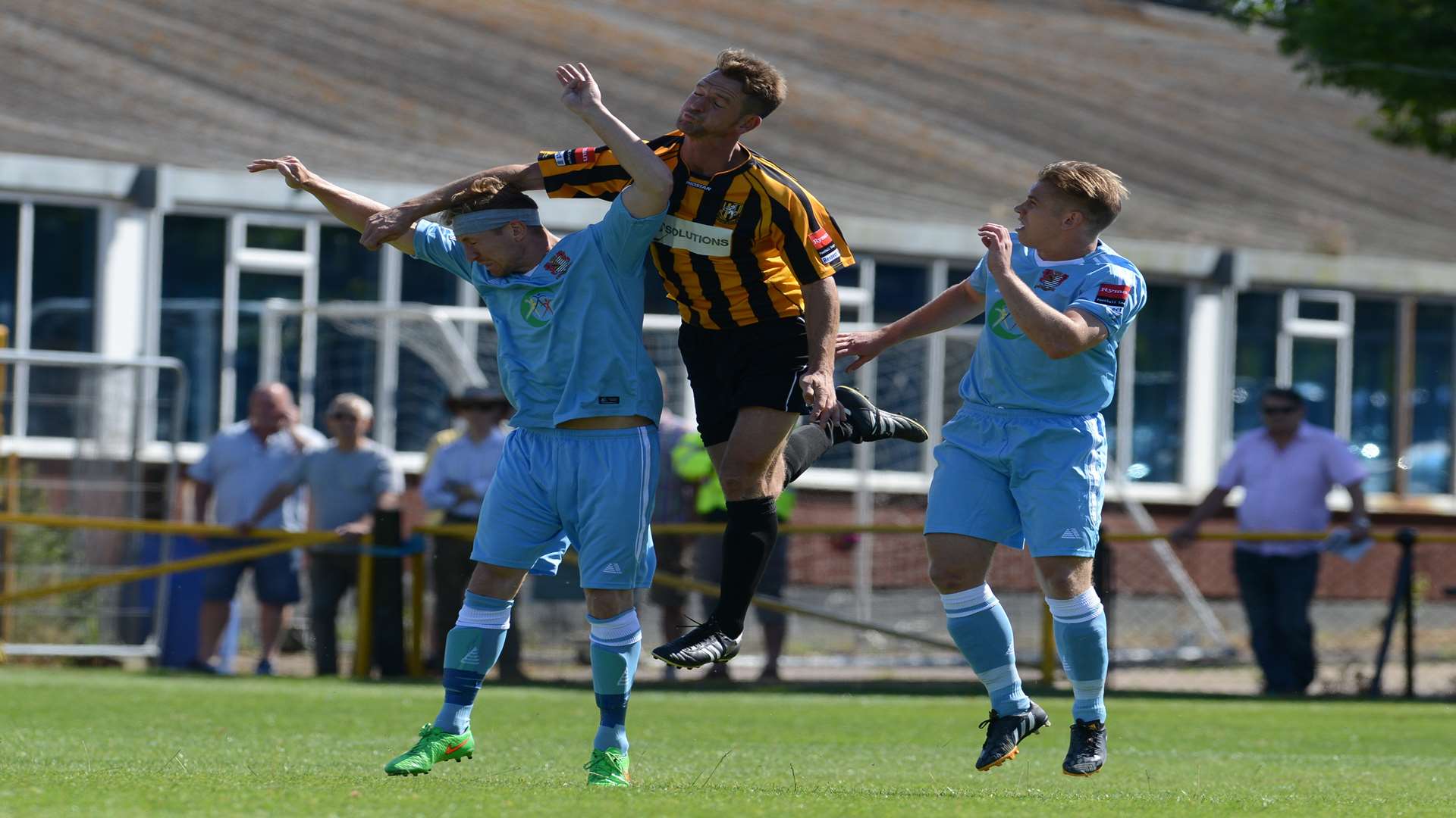 Carl Rook climbs highest to win a header for Folkestone against Molesey Picture: Gary Browne