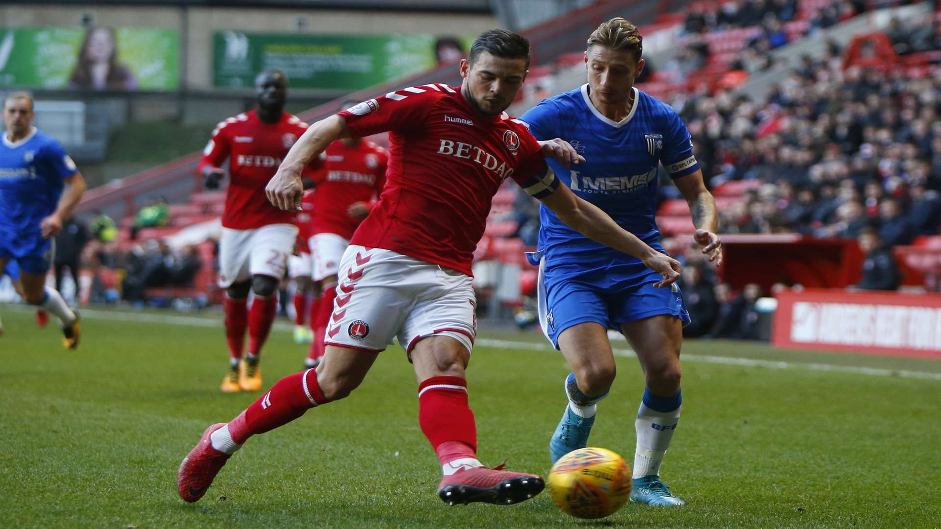 Gills skipper Lee Martin takes on Jake Forster-Caskey Picture: Andy Jones