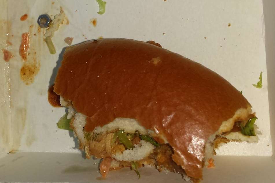 The metal nut, pictured top left, found in a burger from KFC