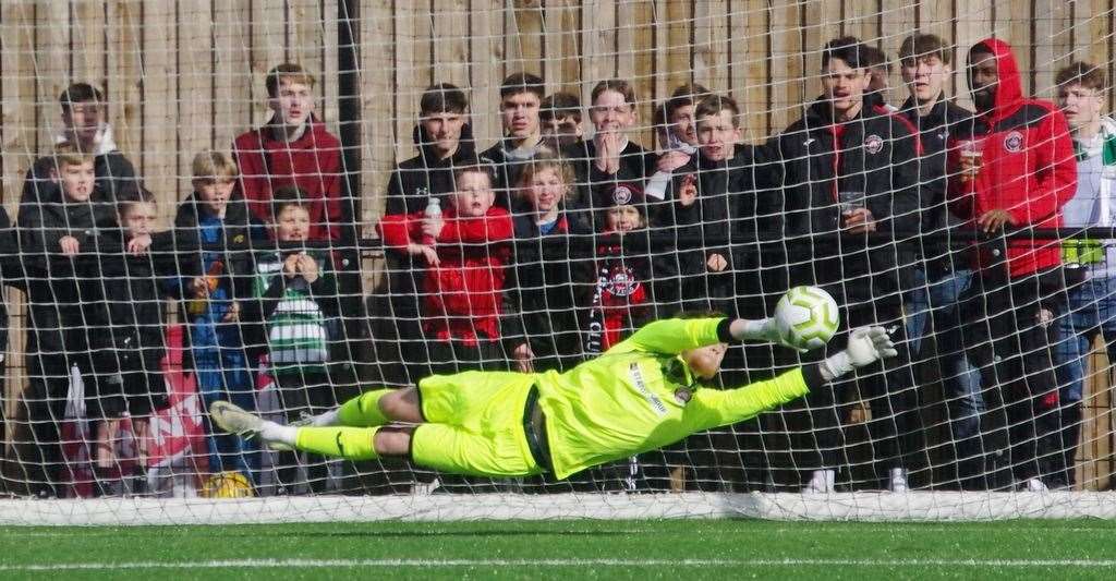 Erith Town keeper Mackenzie Foley produces a save during the penalty shoot-out. Picture: John Anderson corkyboy@gmail.com