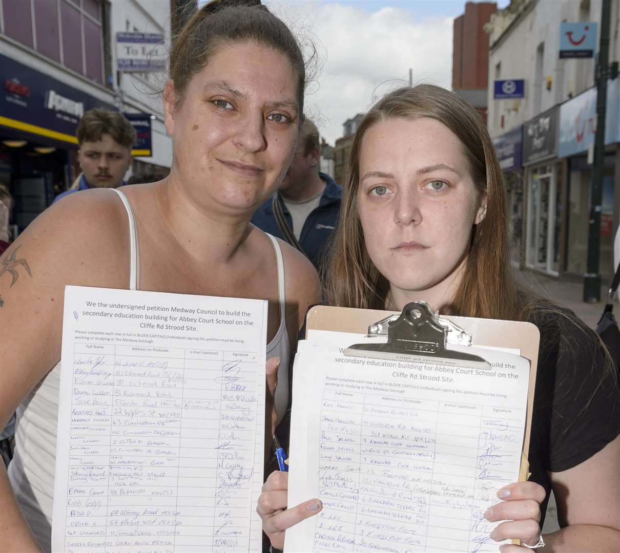 Athena Schuman, left, and Sam De Vere, with petition signatures. Picture: Andy Payton