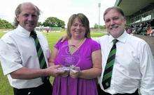 Ashford Town directors Tony Betteridge (left) and Don Crosbie (right) before their relationship broke-down, with Elaine Orsbourne receiving the Ryman League's Programme of the Year Award