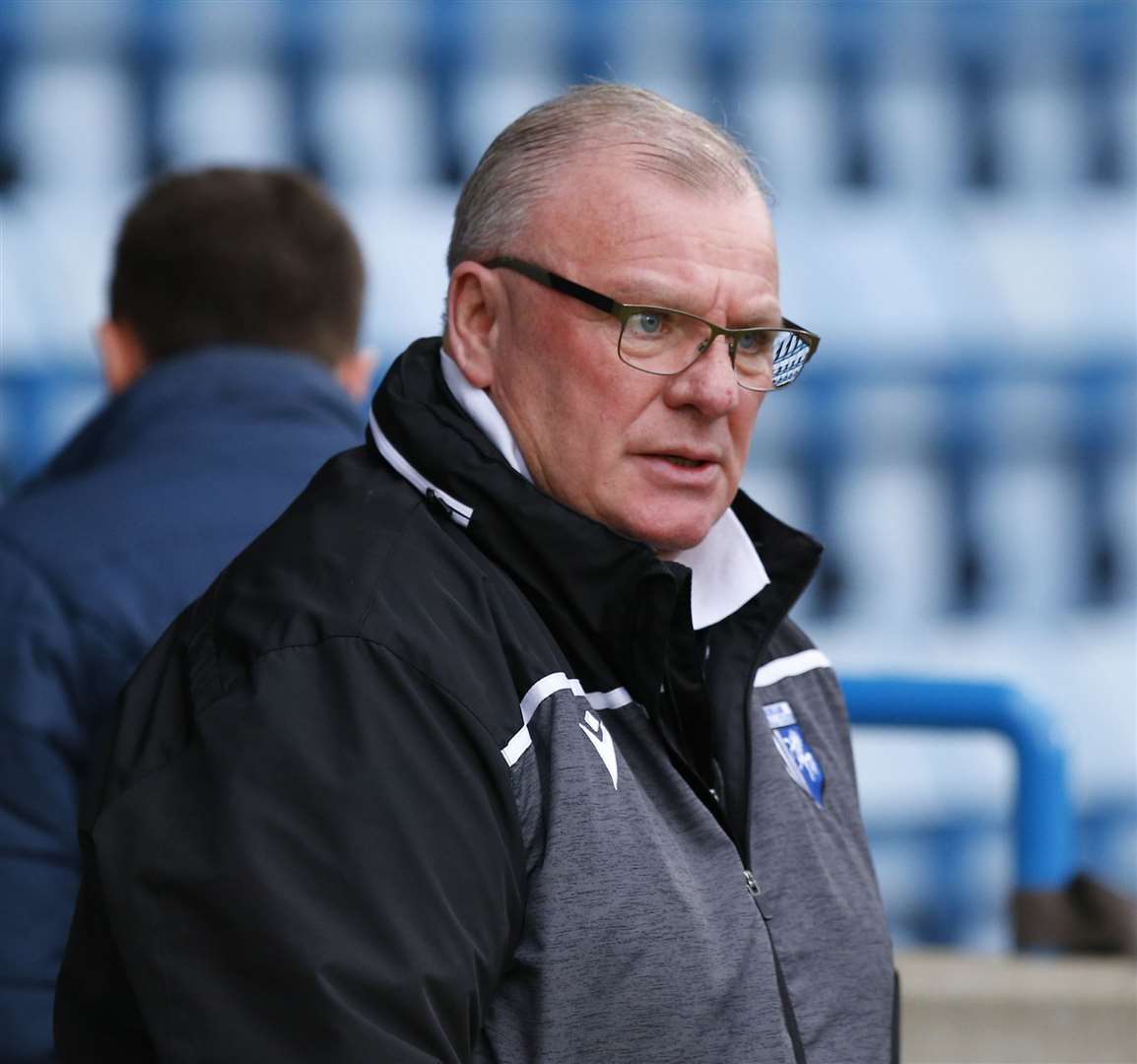 Boss Steve Evans watches from the touchline. Picture: Andy Jones