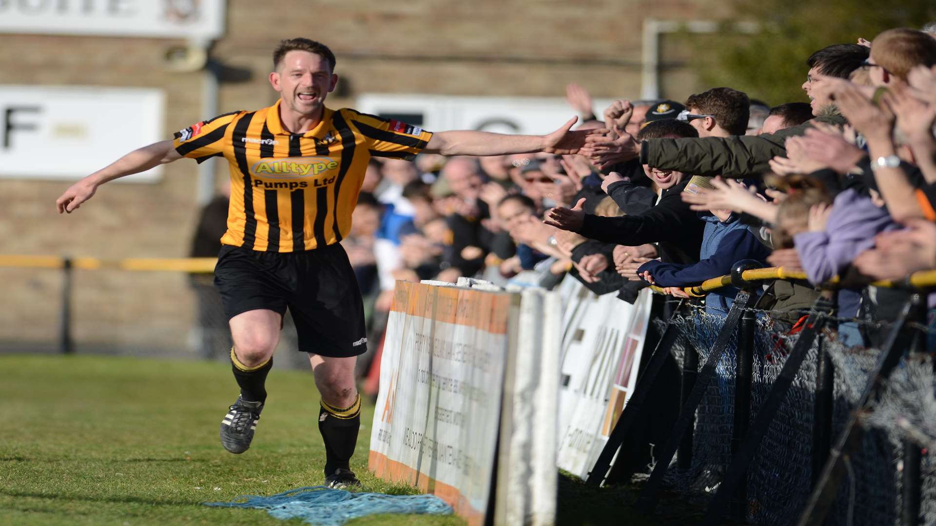 Two-goal Carl Rook celebrates with the Folkestone supporters Picture: Gary Browne