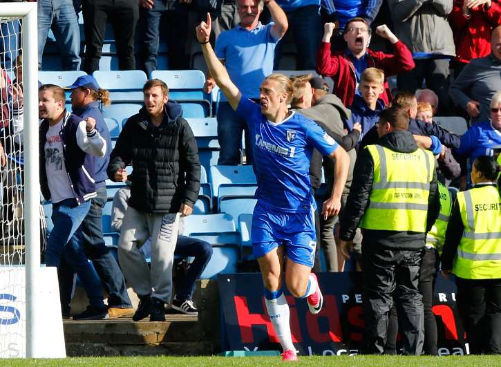 Tom Eaves celebrates the goal that clinched a win for Gillingham over Charlton Picture: Andy Jones