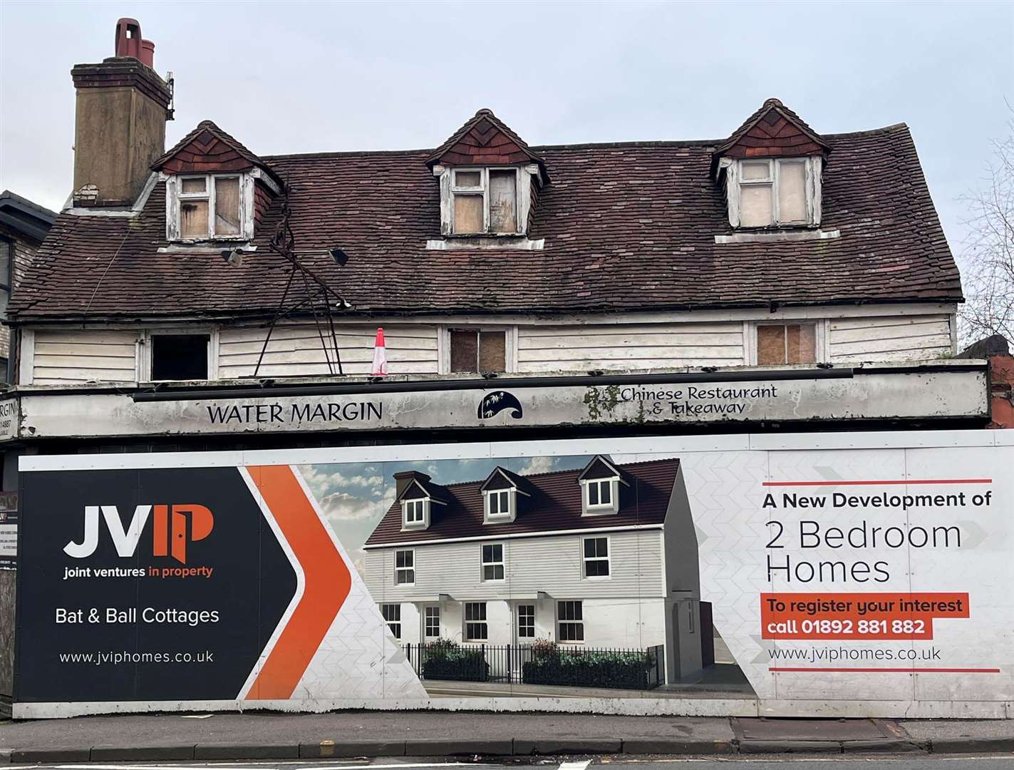 JVIP hoardings showing former plans to turn the pub into cottages. Picture: Southborough Society