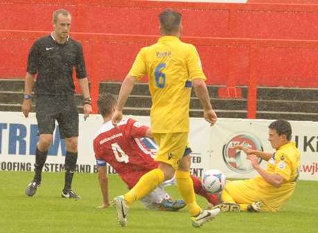 Daryl McMahon was sent off for this challenge on Wealdstone's Luke O'Nien Picture: Steve Crispe