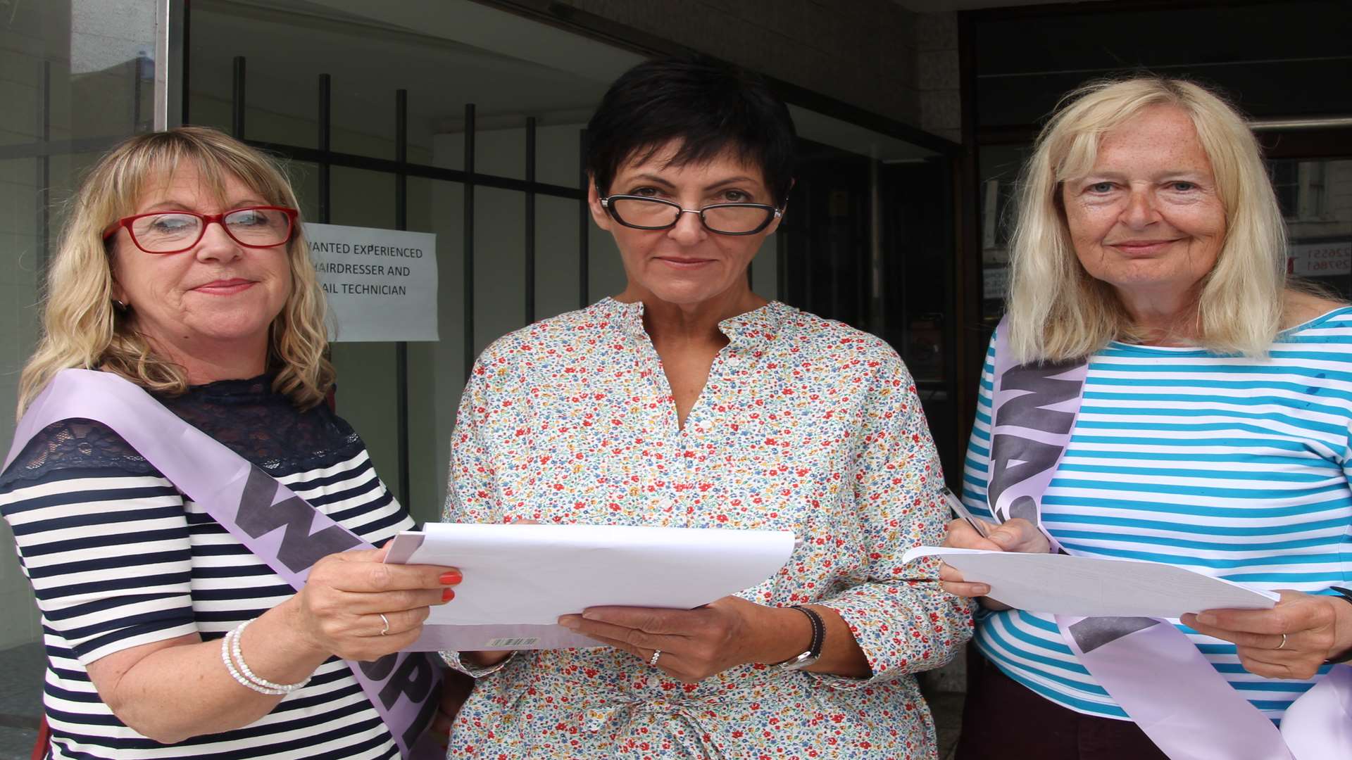 Penny Wells, left, and Leilah Leask, right, talk to Marla Madison about pension arrangements and the Waspi campaign
