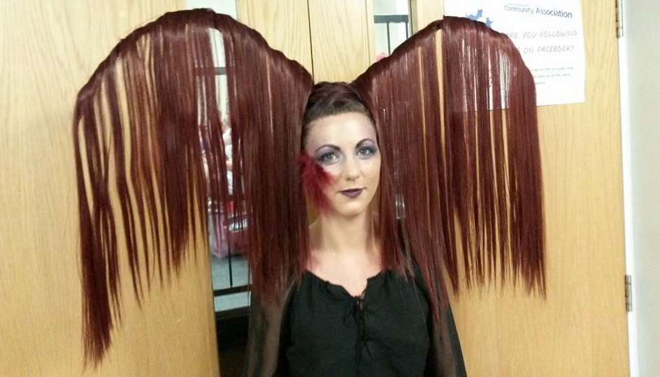 Suzy Stockwin won with her peacock dress hair design