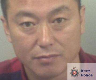 Hongnan Wu has been jailed for 14 months along with his wife for running a brothel. Picture: Kent Police