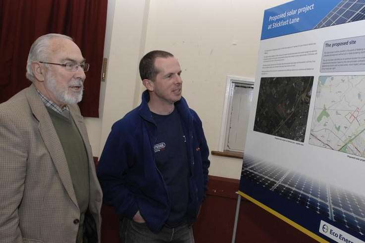 Residents examine the display at the proposed Bobbing solar farm public exhibition