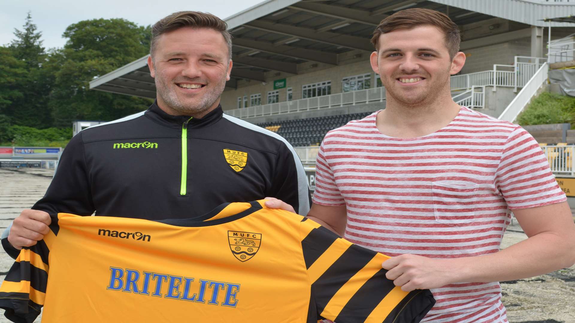 Maidstone United boss Jay Saunders with new signing Tom Murphy