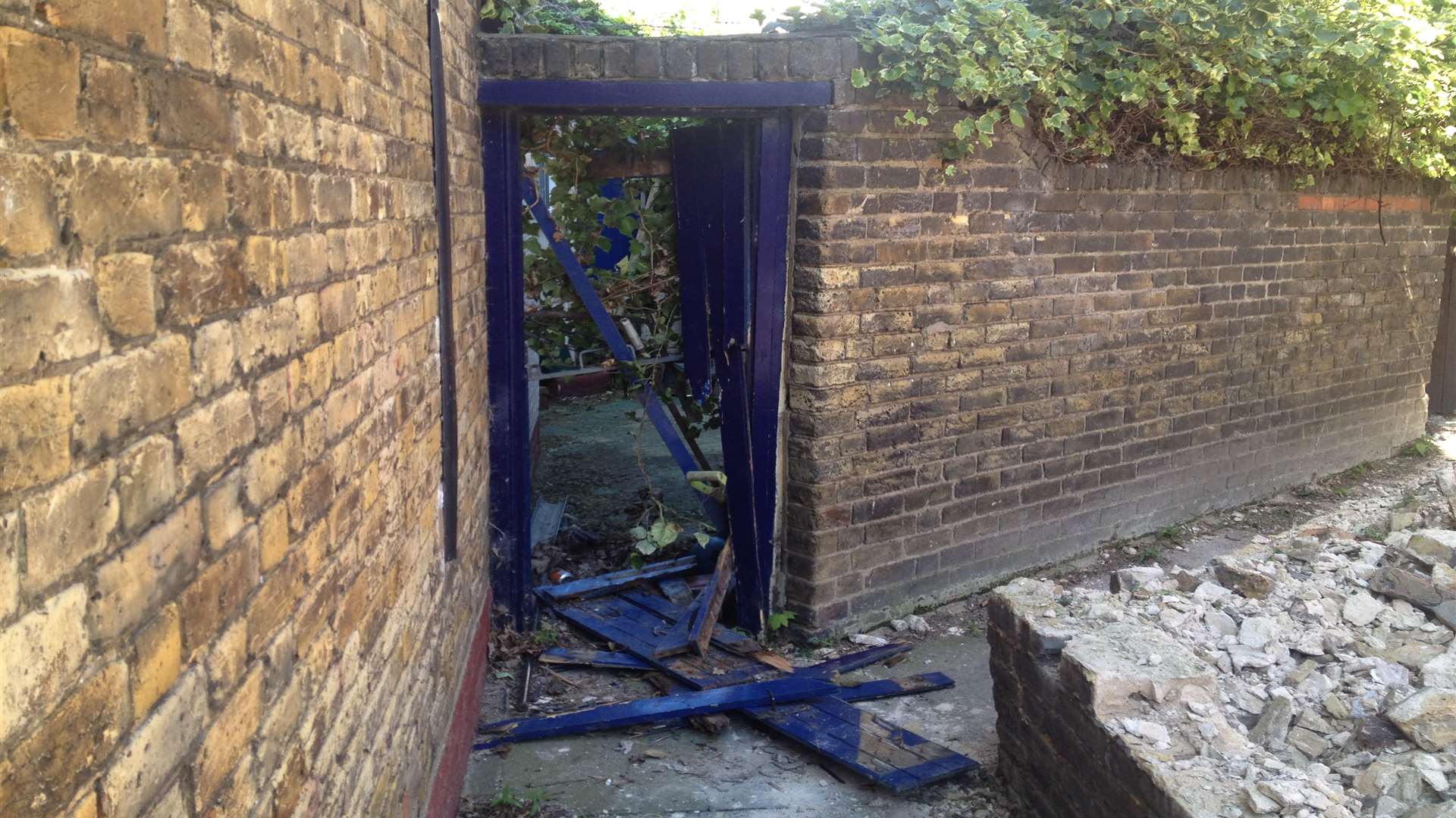 The wooden gate which was smashed in at the back of a house in Broadway, Sheerness