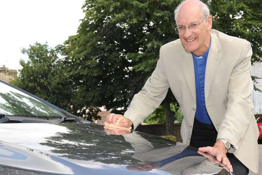 The Rev Peter Guinness polishes the family car ready to drive his daughter to wedding – as well as giving her away and conducting the service