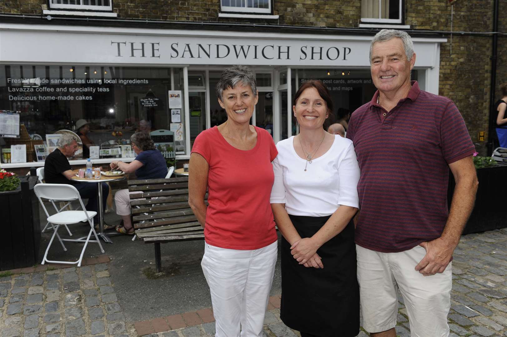 Sue Laslett, shop manager Kathy Wilson and Steve Laslett celebrating the opening of The Sandwich Shop