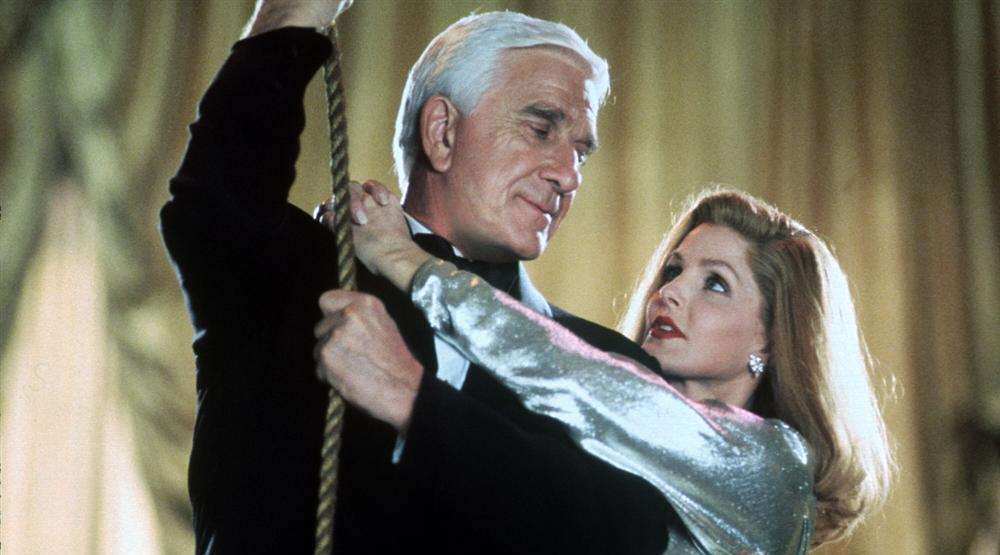 Leslie Nielsen and Priscilla Presley in Naked Gun 33 and a third