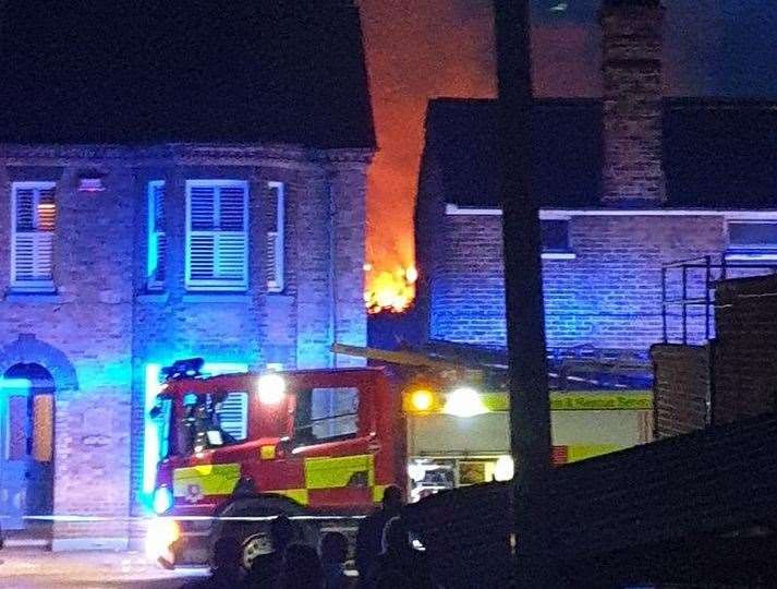 Firefighters tackled the blaze in a derelict property behind homes in Gladstone Road. Picture: Sam Gambrill