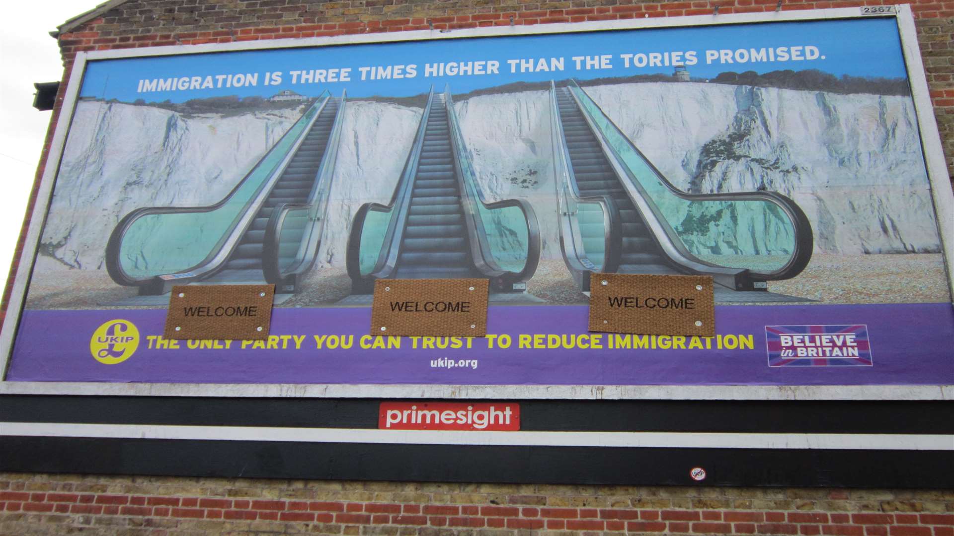 The poster in Ramsgate was 'defaced' with welcome mats