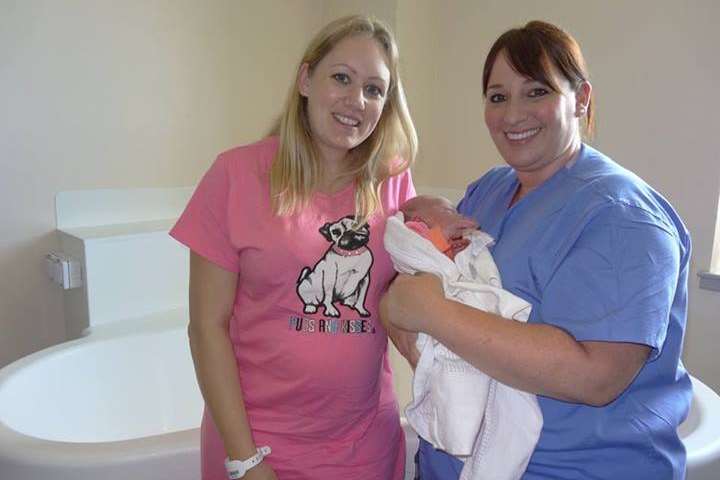 Angela Chapman and baby Bethany Rose with midwife Natalie Barnes