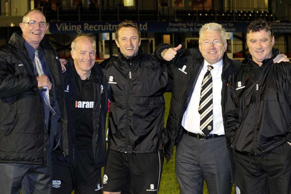 Dover boss Chris Kinnear, second right, and his staff after the FA Cup win against Eastbourne Borough at Crabble on Tuesday night. Picture: Tony Flashman