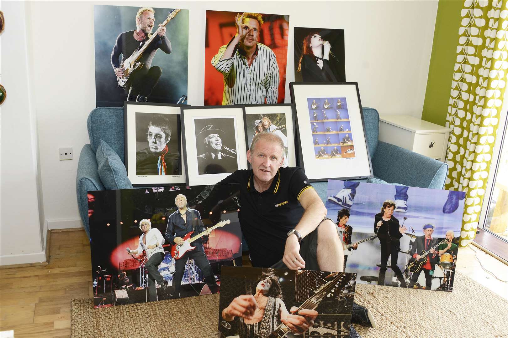 Herne Bay music photographer Matt Kent with some of the images he will be exhibiting. Picture: Paul Amos